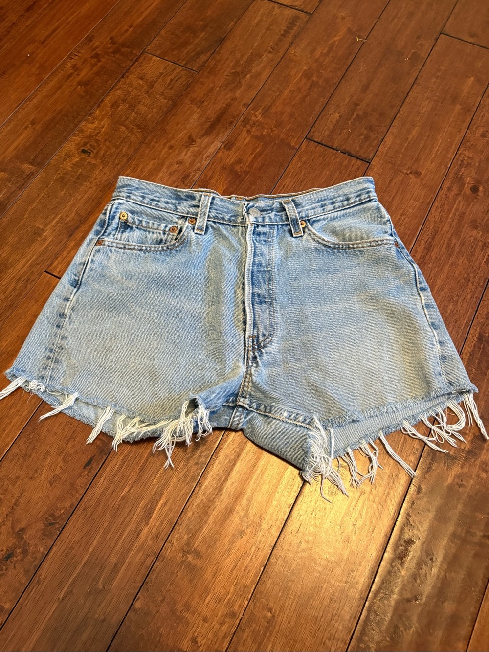 Levi's Light Blue Frayed Denim Cutoff Shorts